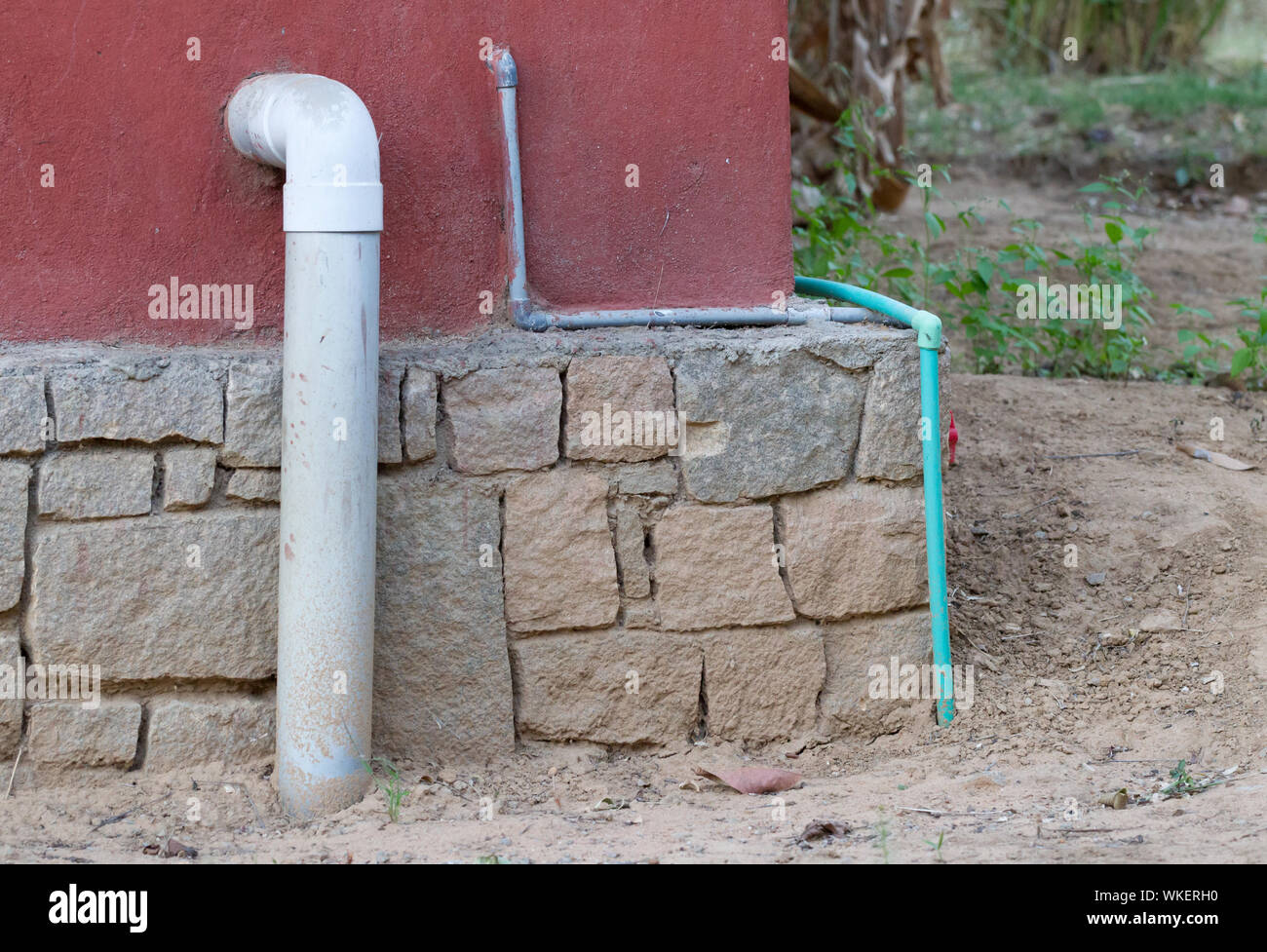Water pipe system outside a house in Madagascar Stock Photo Alamy