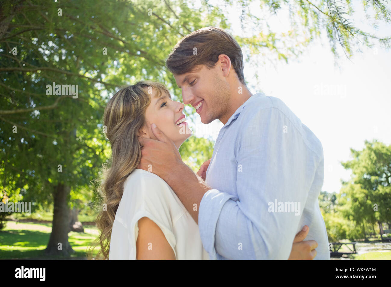 Cute couple laughing hugging in hi-res stock photography and images - Alamy