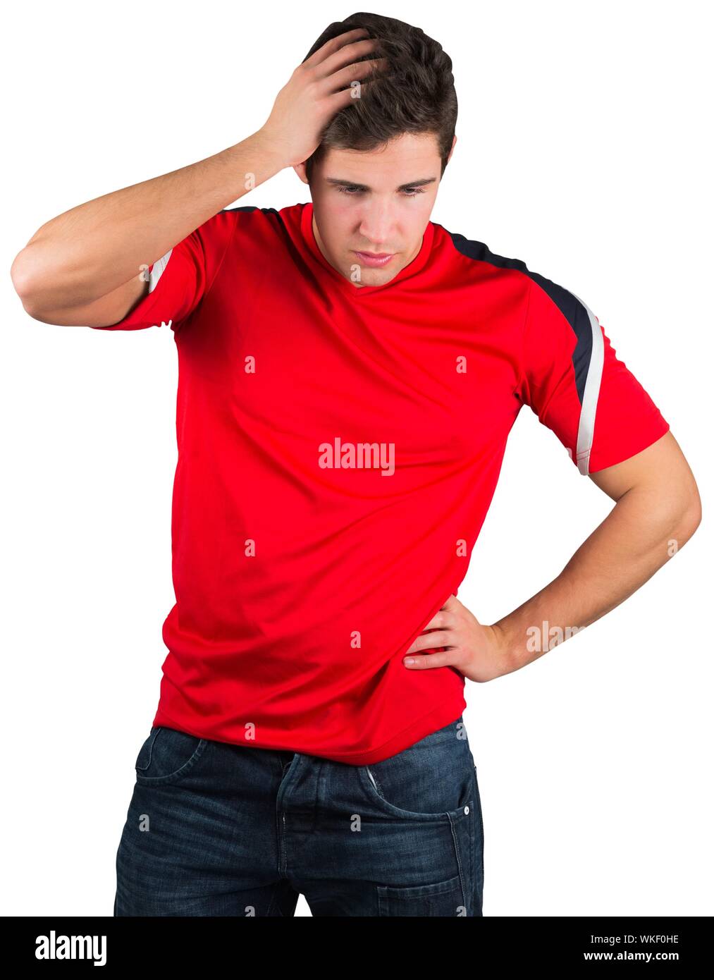 Disappointed football fan in red on white background Stock Photo Alamy
