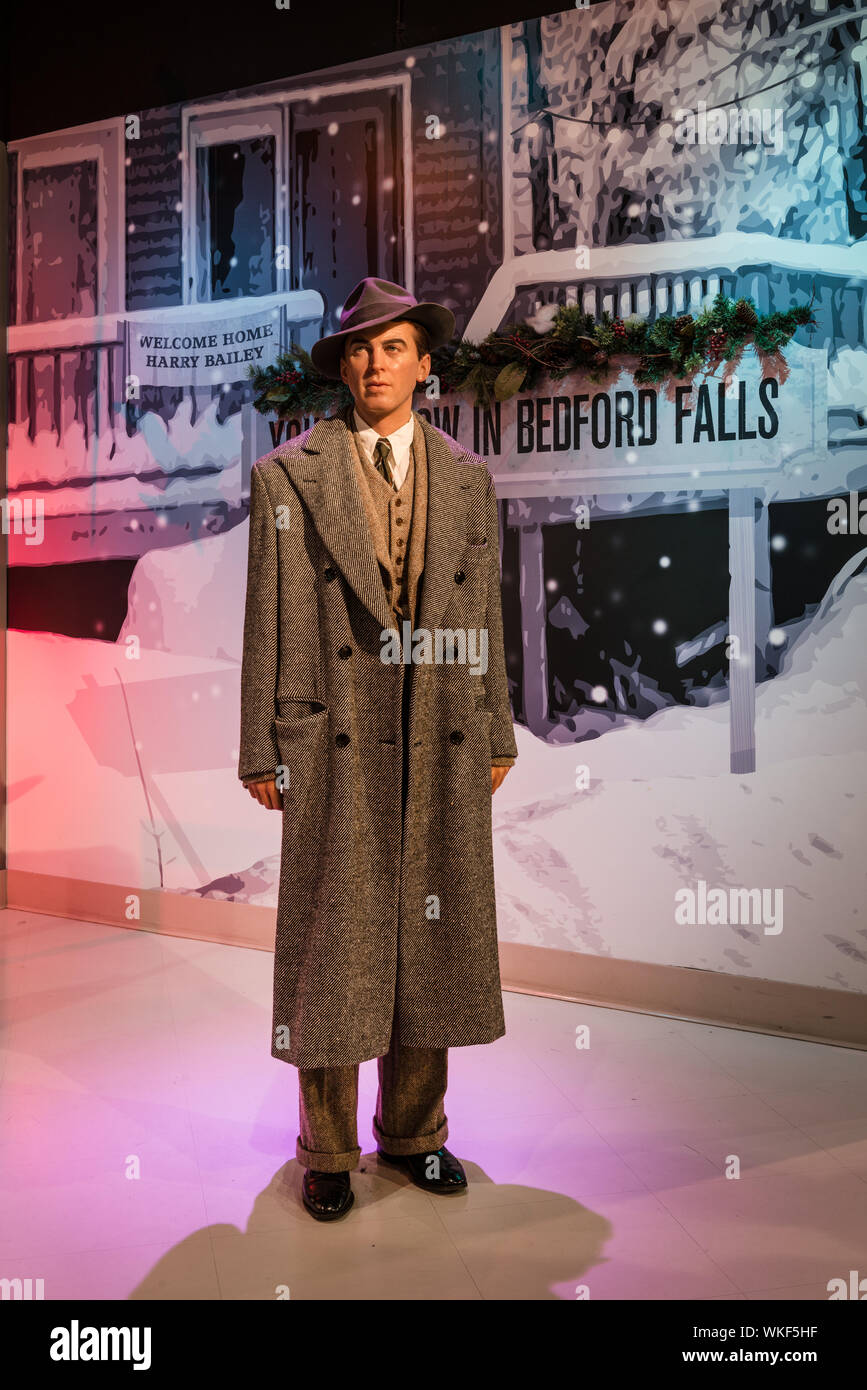 Jimmy Stewart figure revisits Bedford Falls, the setting of his role in the beloved Christmas movie It's a Wonderful Life, at Madame Tussaud's Wax Museum in the Hollywood section of Los Angeles, California Stock Photo