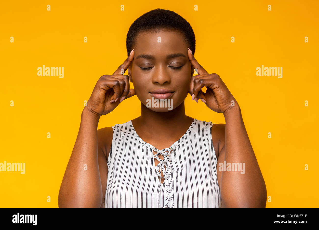 Fingers to temples hi-res stock photography and images - Alamy