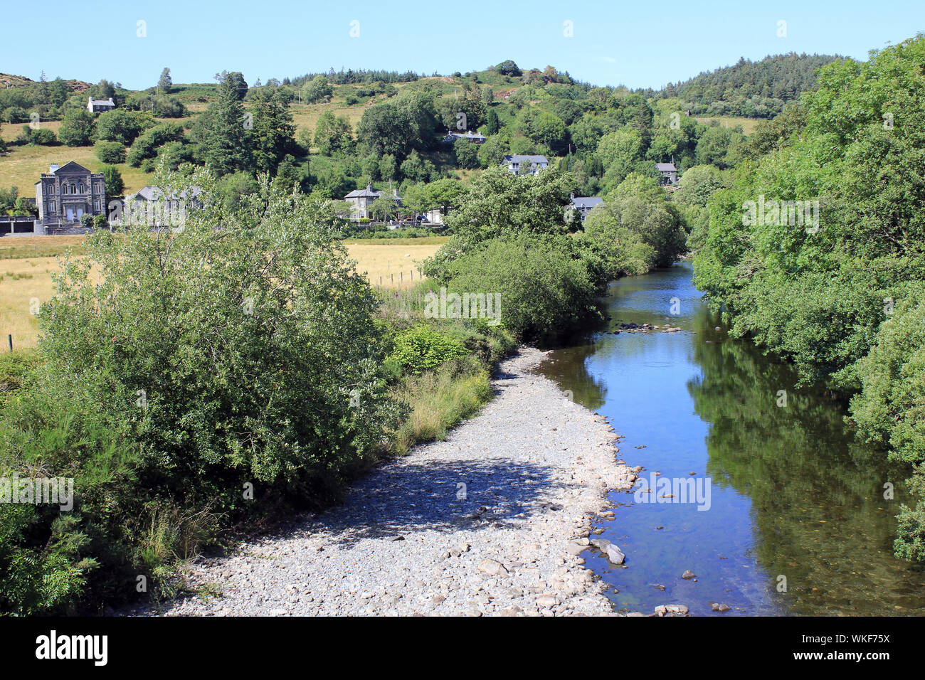 Afon Lledr flowing through the village of Dolwyddelan, Conwy, Wales Stock Photo