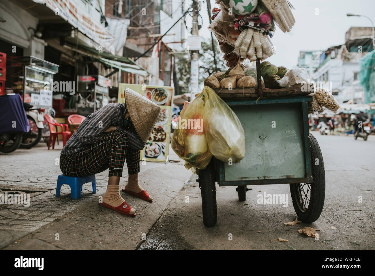 SAIGON, VIETNAM - OCTOBER 31, 2016: People on the streets of Saigon on October 31, 2016, Vietnam. Stock Photo