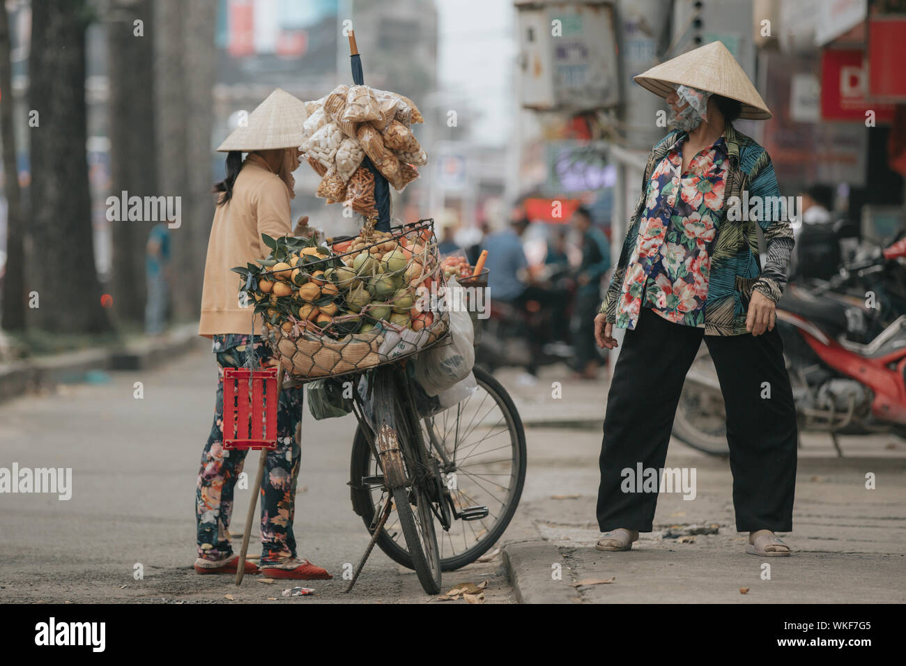 SAIGON, VIETNAM - November 1, 2016: People on the streets of Saigon on October 31, 2016, Vietnam. Stock Photo