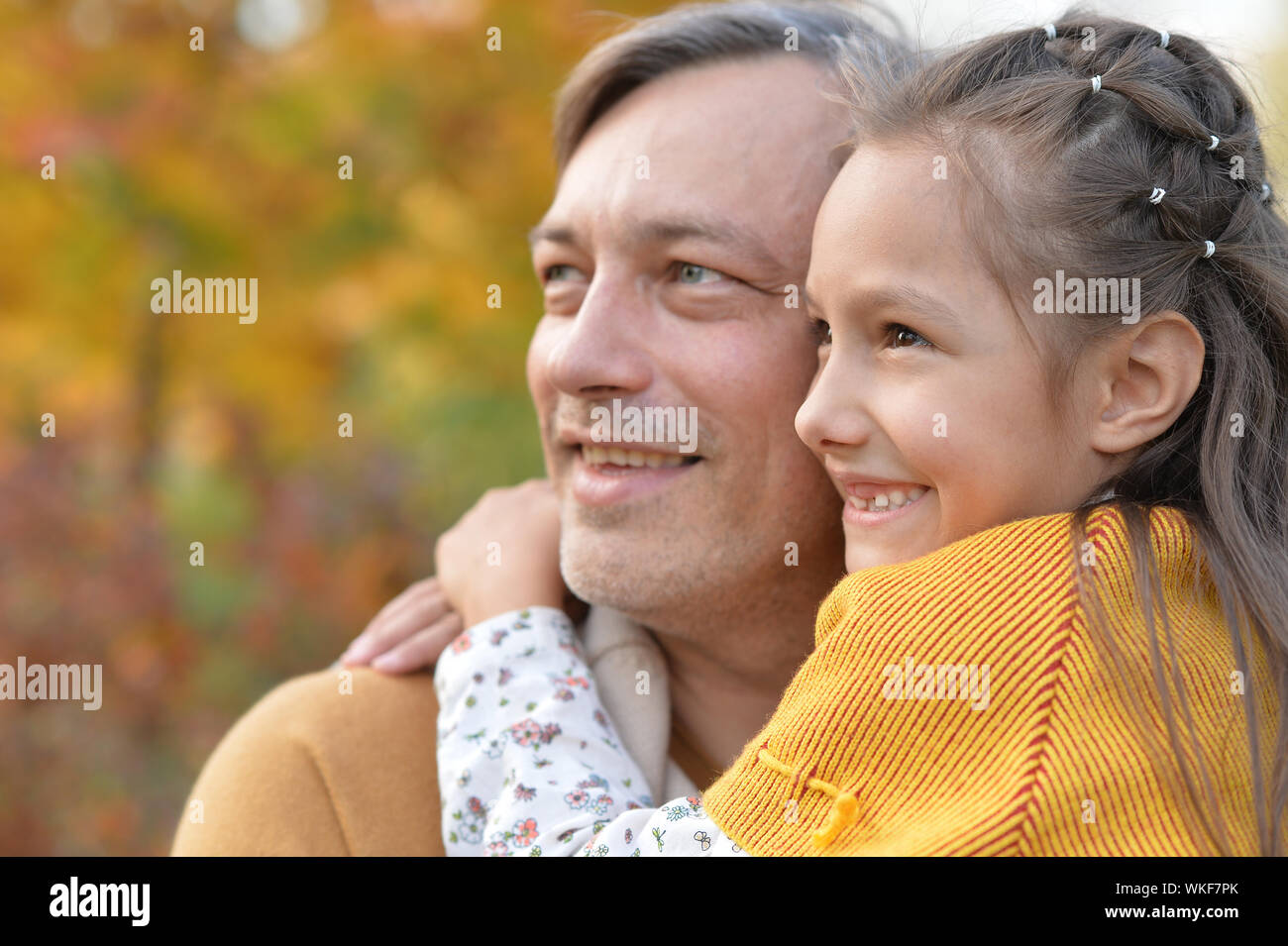 Portrait of father and cute daughter having fun outdoors Stock Photo