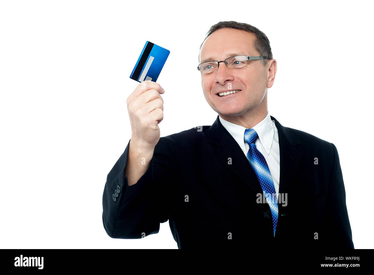 Successful male executive holding credit card Stock Photo Alamy