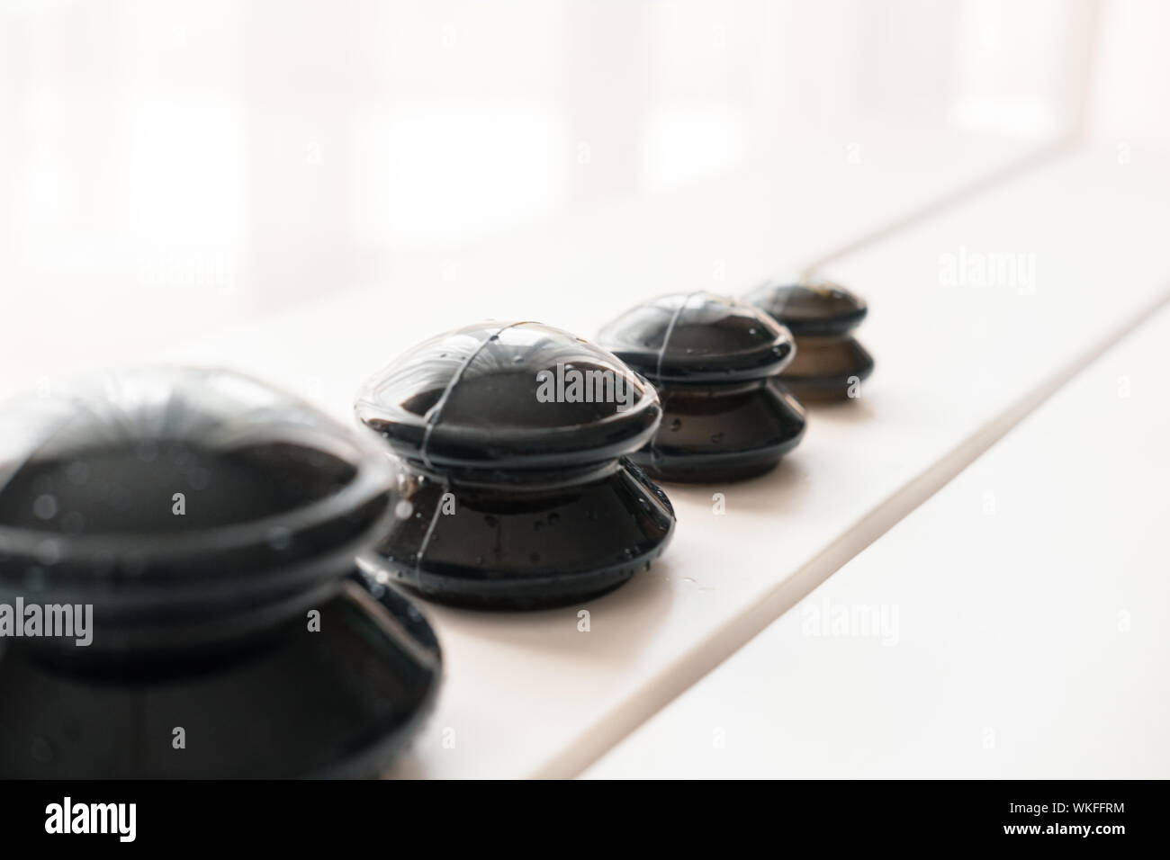 Set of black silicone vacuum suction massaging cups. Anti cellulite