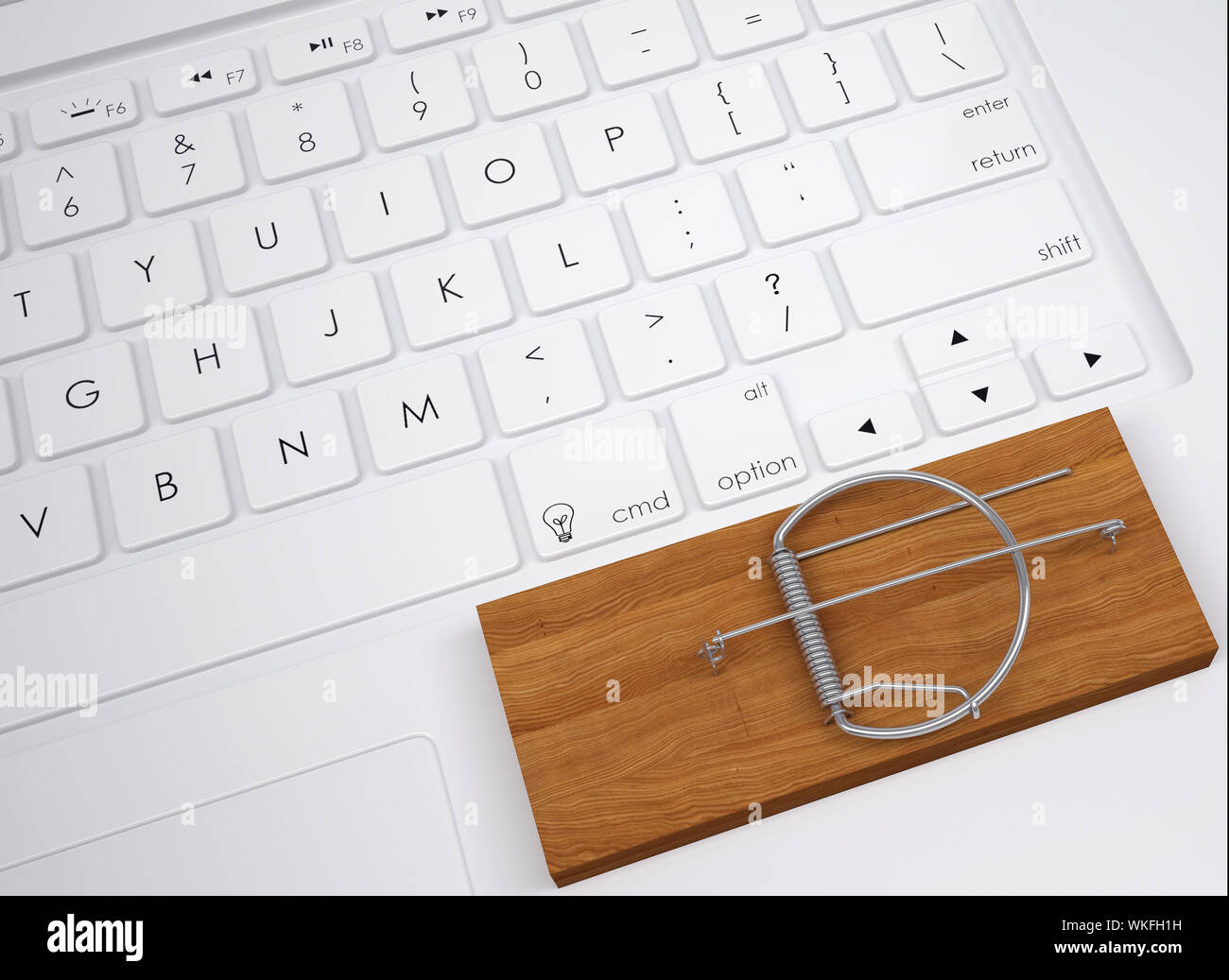 Mousetrap on the keyboard. View from above Stock Photo