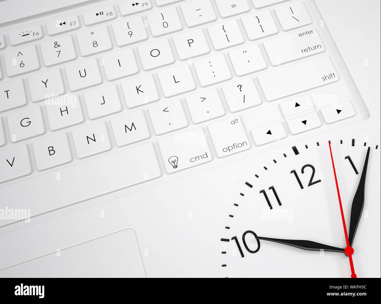 Clock face on the keyboard. View from above Stock Photo