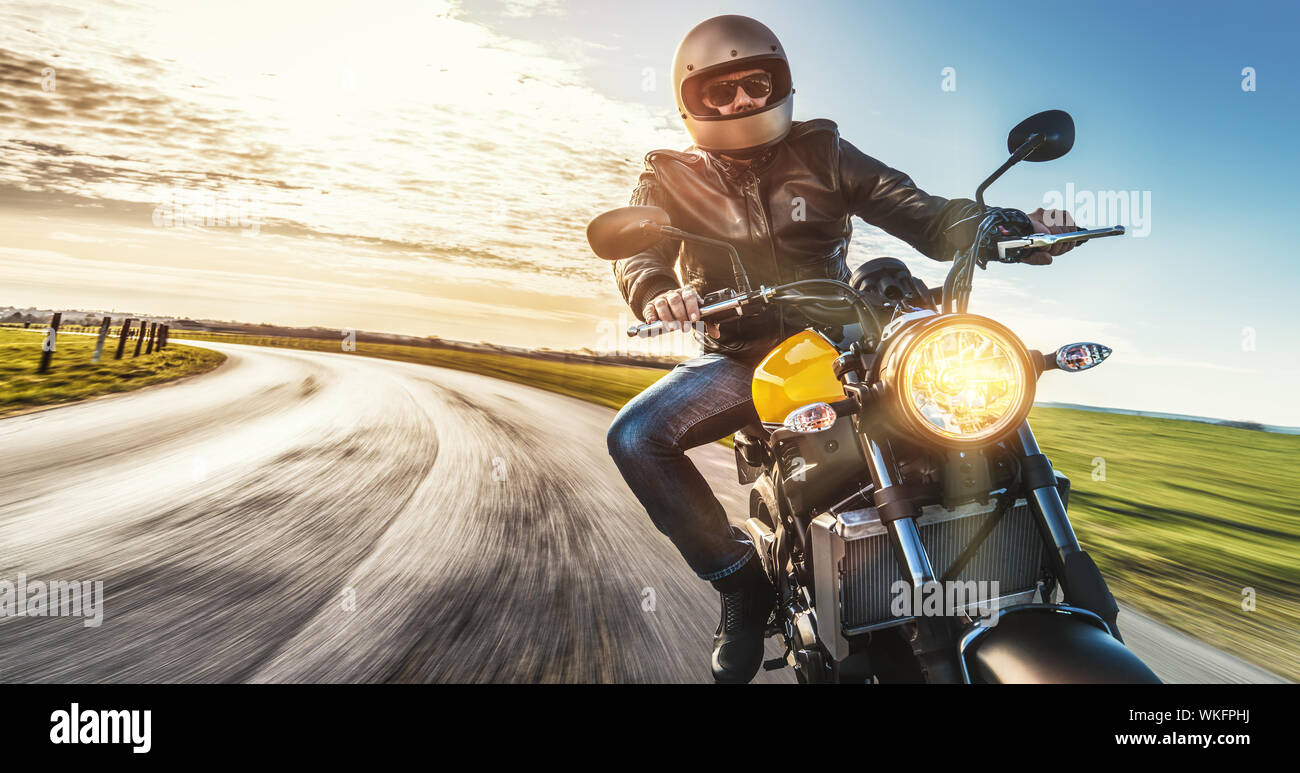 Biker riding motorcycle low angle hi-res stock photography and images ...