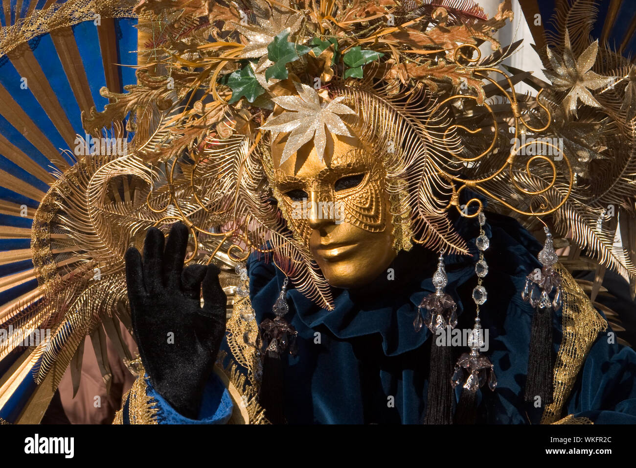 An elaborate gold mask and costume at the Venice Carnival Stock Photo ...