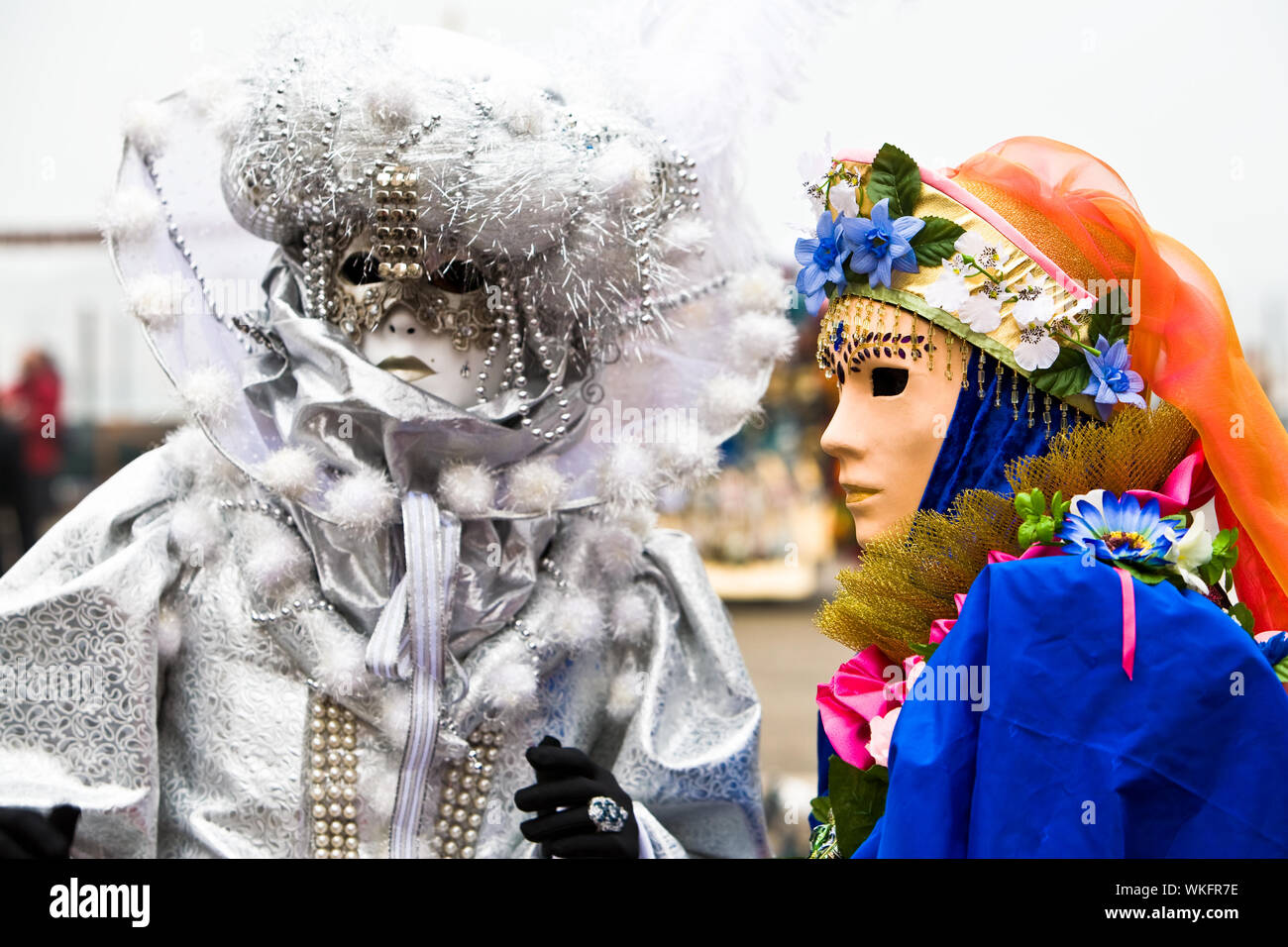 Two people in costume at the Venice Carnival Stock Photo - Alamy