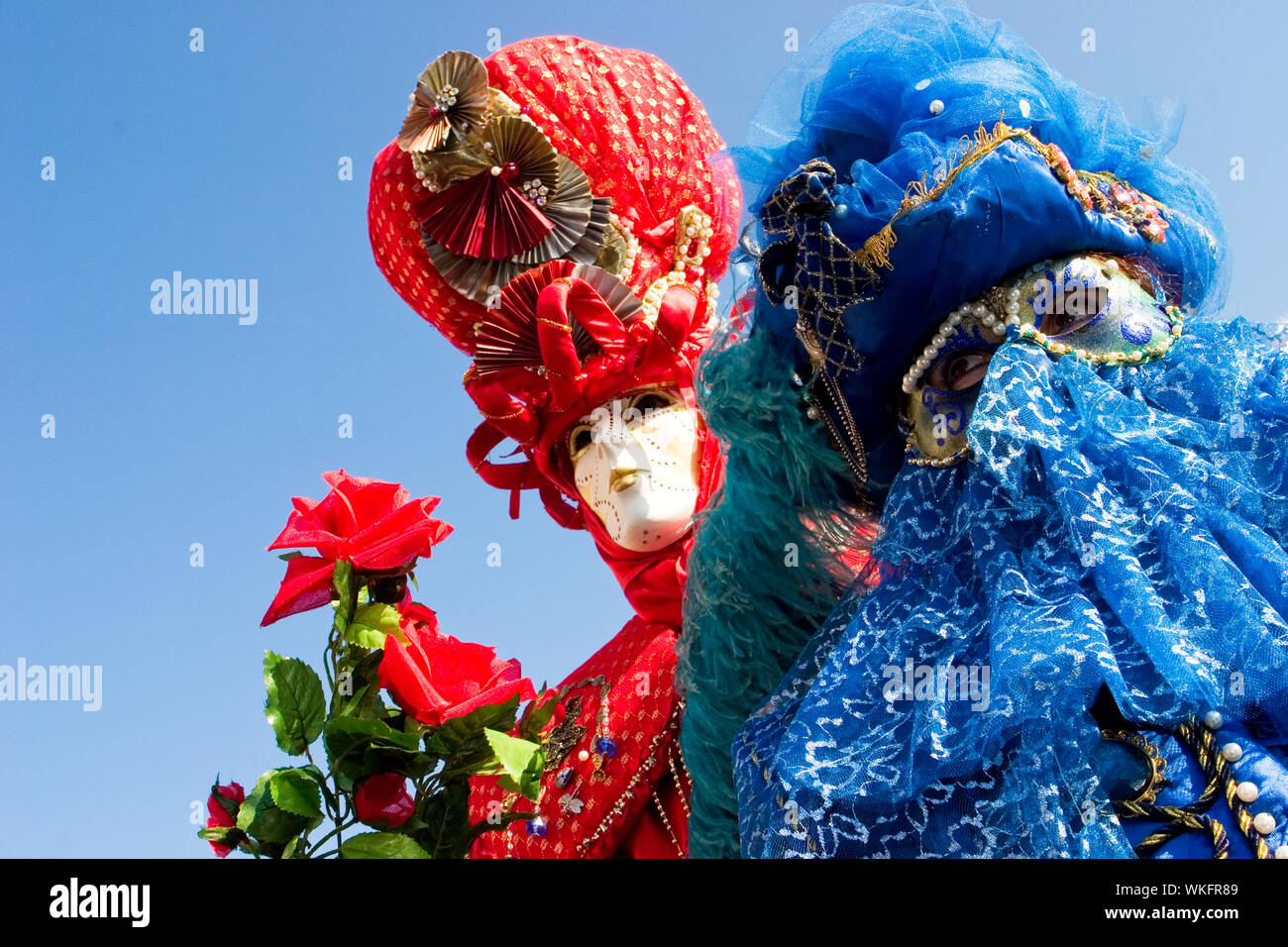 Two people in costume at the Venice Carnival Stock Photo - Alamy
