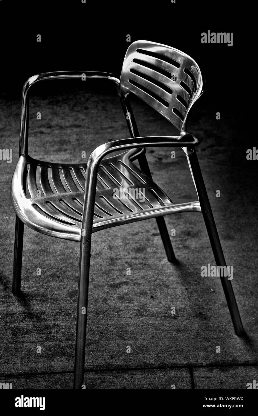 Empty Chair On Concrete Stock Photo Alamy