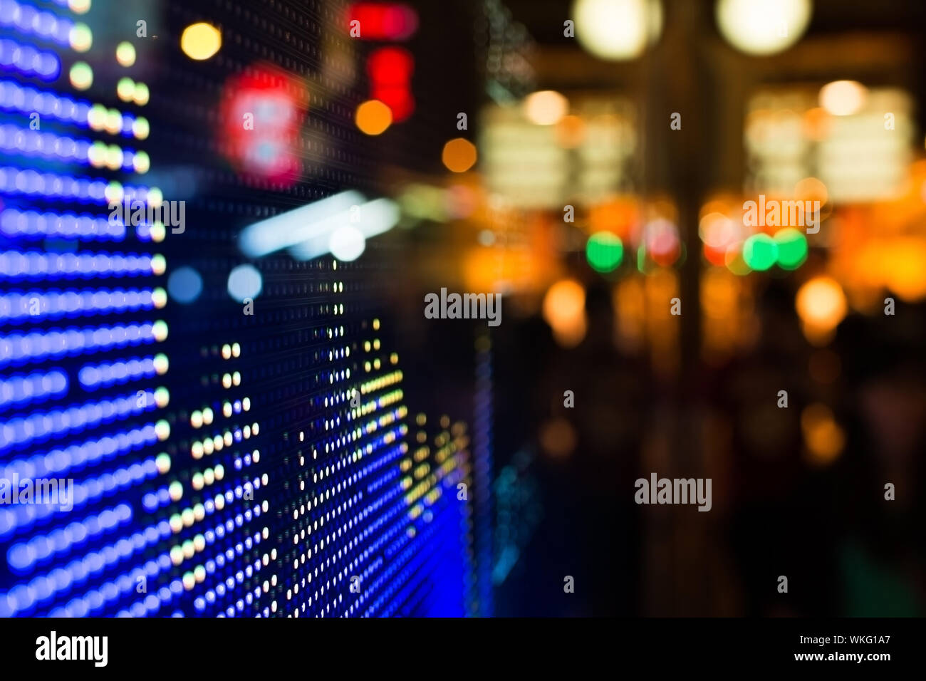 Hong Kong stock market price display at street in the night Stock Photo ...