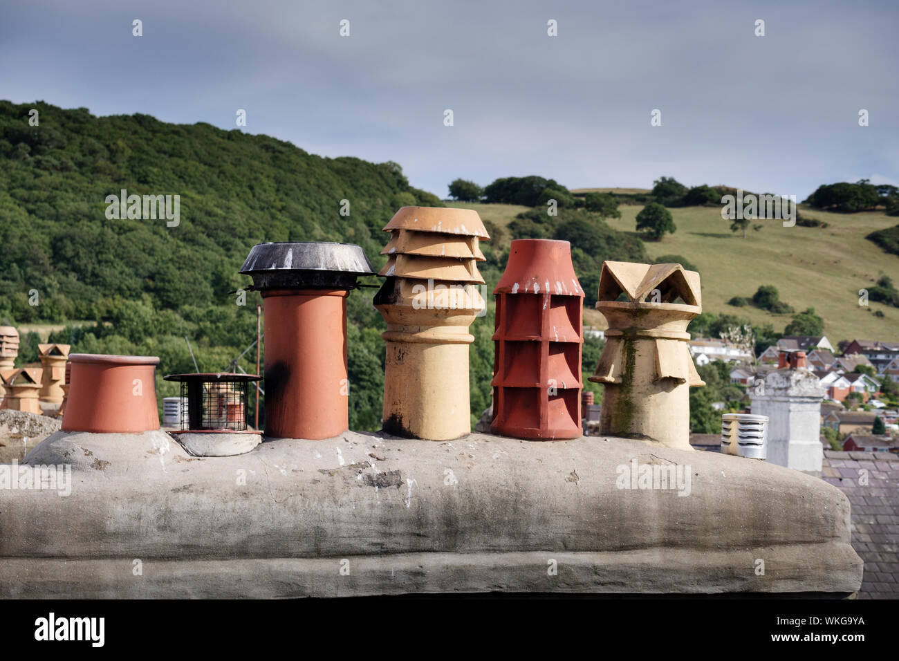 Chinmey pots on a roof showing different old style ones Stock Photo