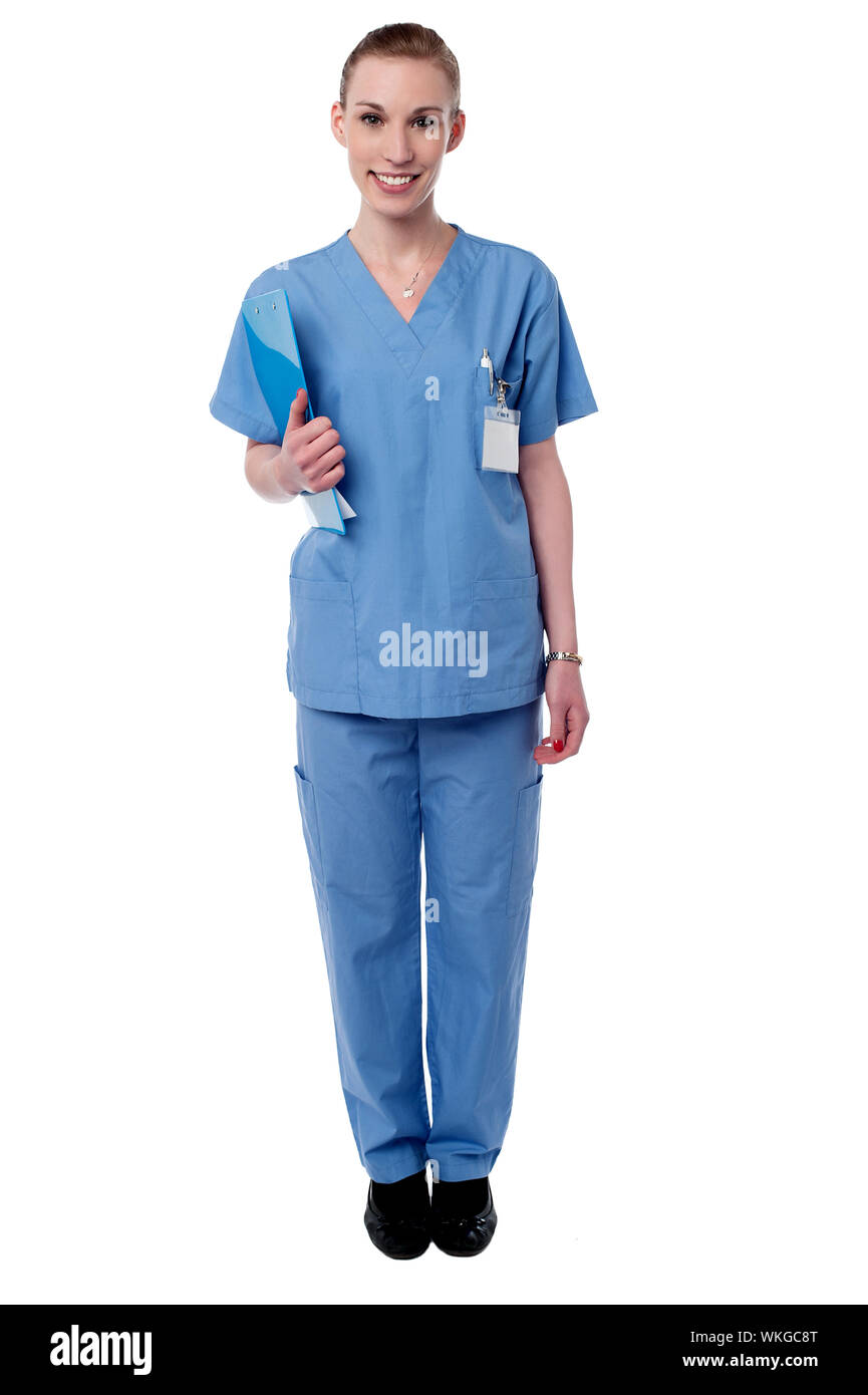 Smiling female nurse holding clipboard Stock Photo - Alamy