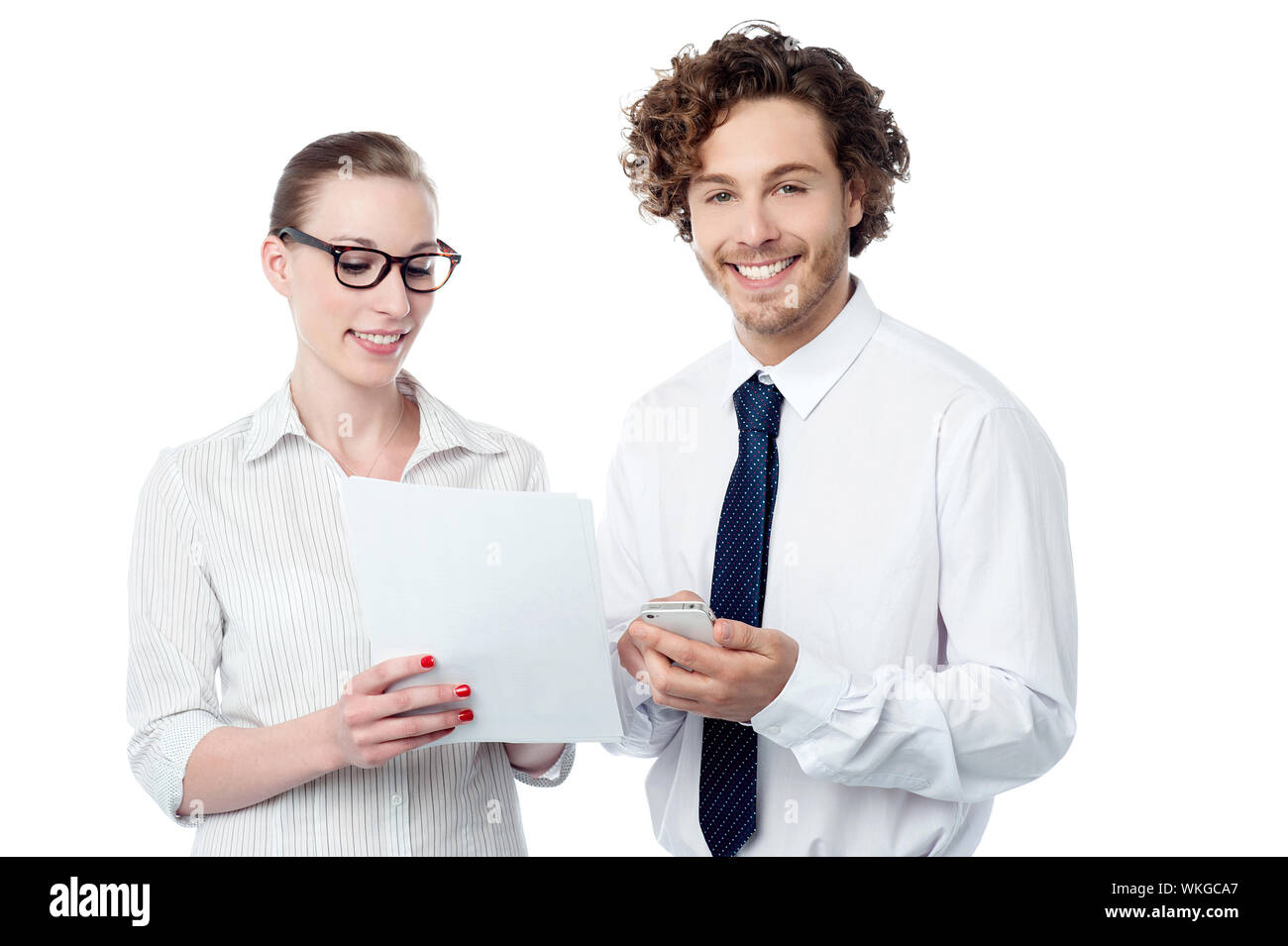 Business executives analyzing annual report Stock Photo