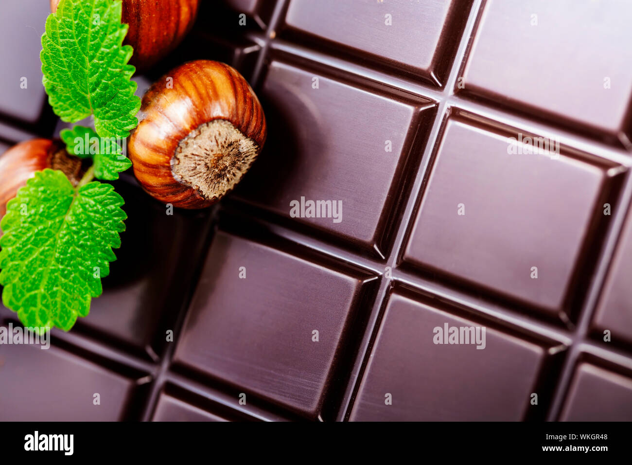 dark chocolate bar with hazelnuts Stock Photo Alamy