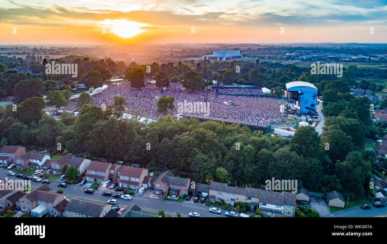 Picture dated August 24th shows  Chantry Park in Ipswich,Suffolk, with 40,000 Ed Sheeran fans watching his second show of four in his home town as he finishes  his record breaking three year Divide tour.  The singer-songwriter's tour has surpassed U2's 7.3 million record attendance and has averaged 34,541 people per show over the 255 shows. It is the highest grossing and most attended tour ever. Stock Photo