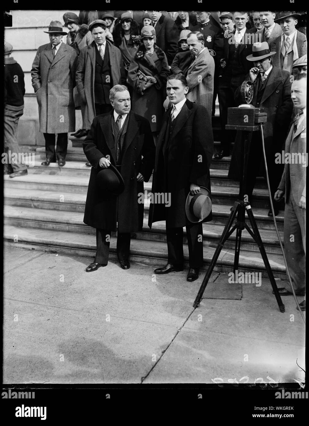 John D. Rockefeller, Jr., (left) as he left the Capitol in