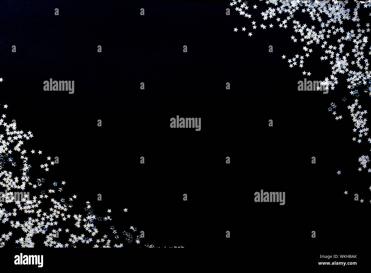 Star shaped silver sequins background. Copy space. Stock Photo