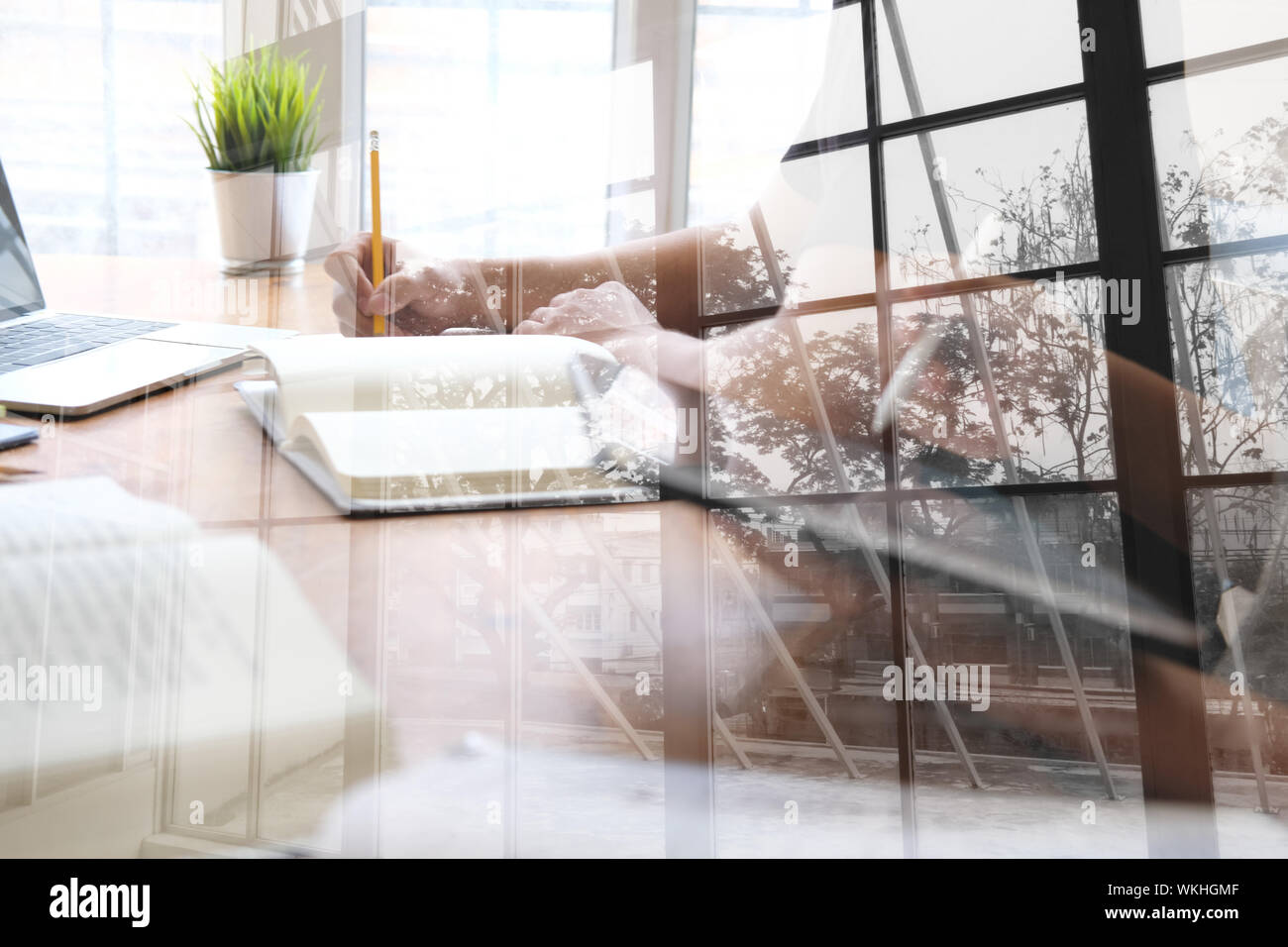 man studying design lesson with graphic tablet. college student learning online taking note Stock Photo