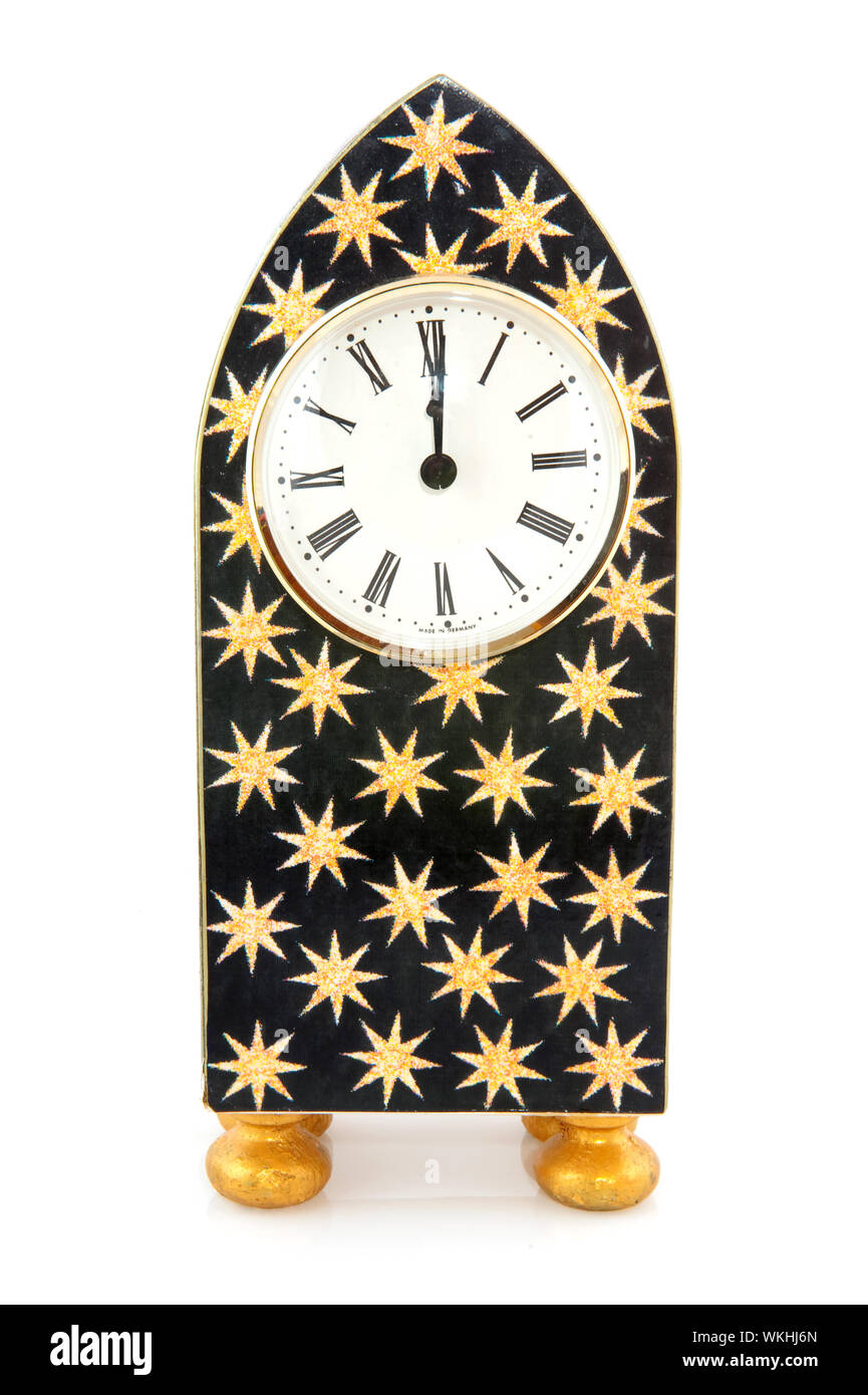 Twelve O'Clock with fireworks at new years eve Stock Photo