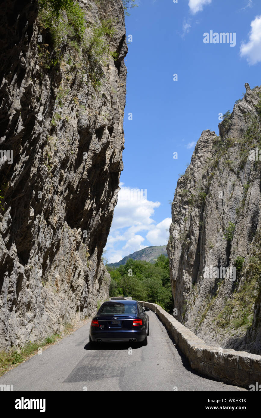 Car Driving Through Clue de Barles, or Barles Gorge or Canyon in the Geopark Réserve Géologique de Haute Provence, north Digne-les-Bains, Provence Stock Photo