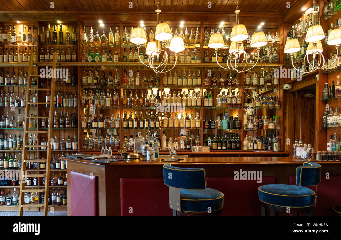 Interior of bar at Torridon Hotel on the North Coast 500 tourist motoring route in northern Scotland, UK Stock Photo