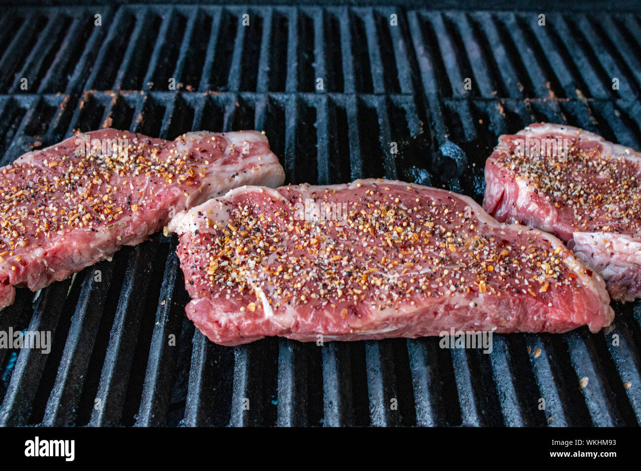 Steak that has been spiced with Montreal steak spice Stock Photo Alamy