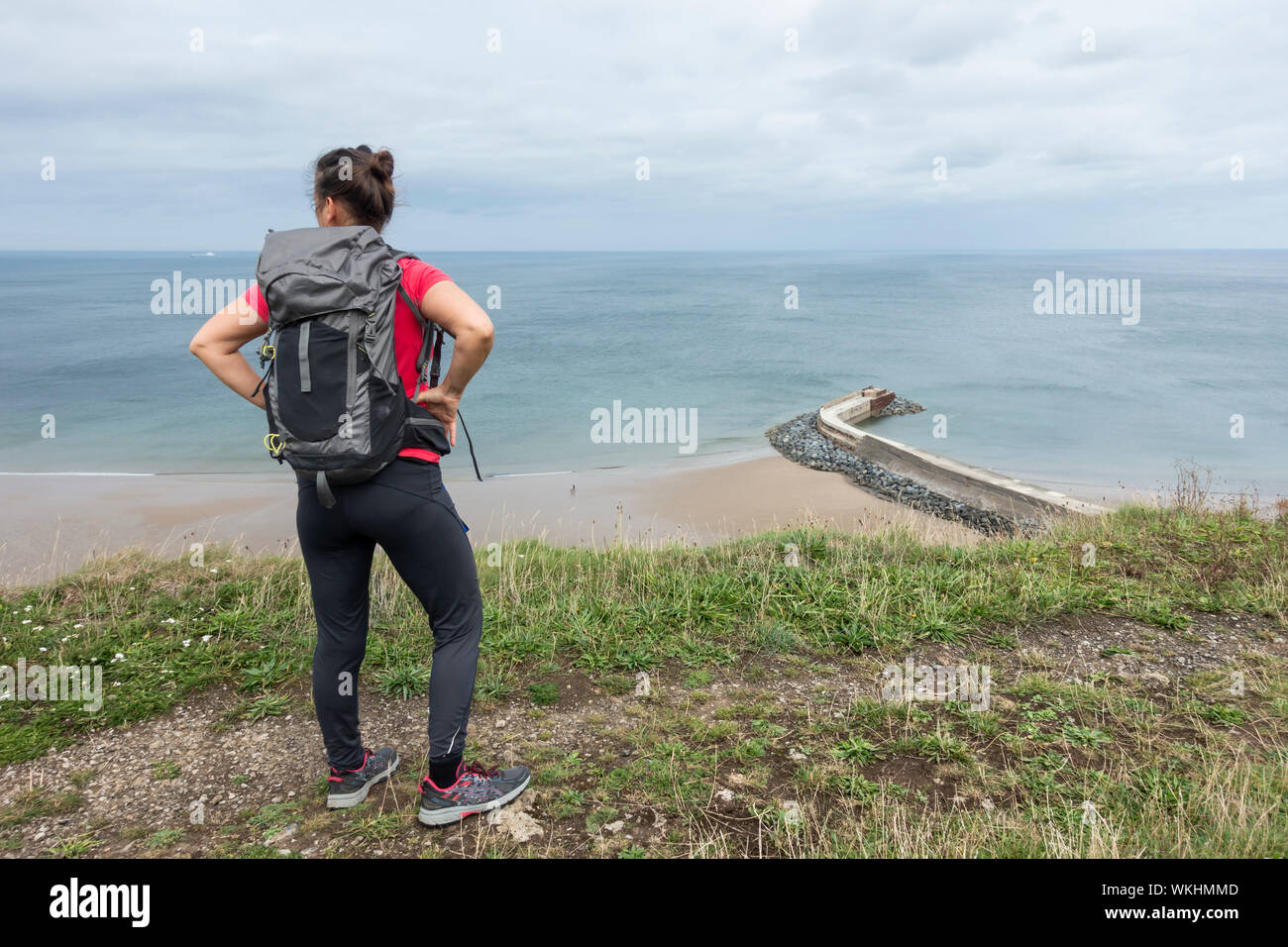 Mature woman hiking on trail hi-res stock photography and images - Alamy