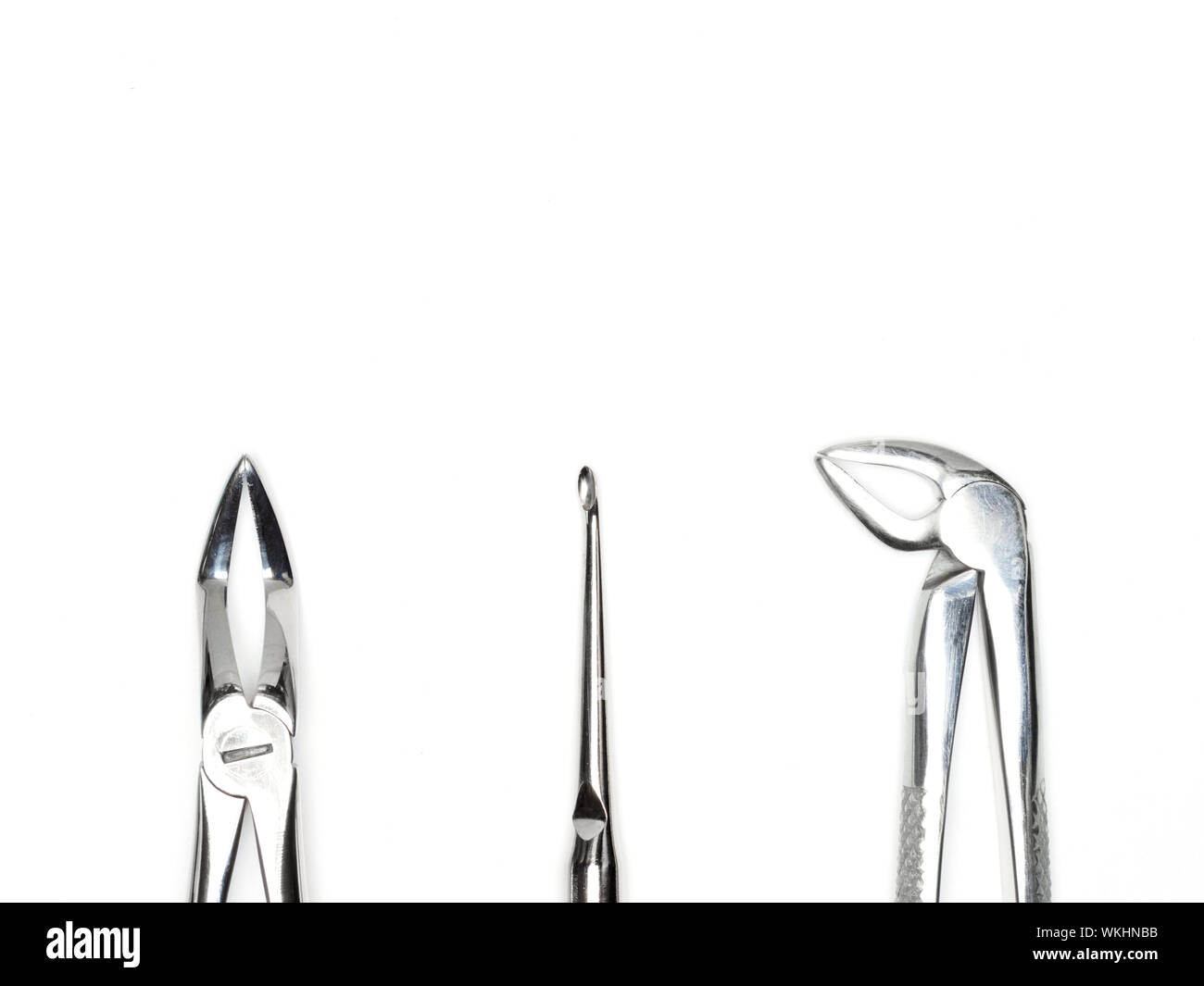 Dental surgical instrument on white background with copyspace. Dental care concept Stock Photo