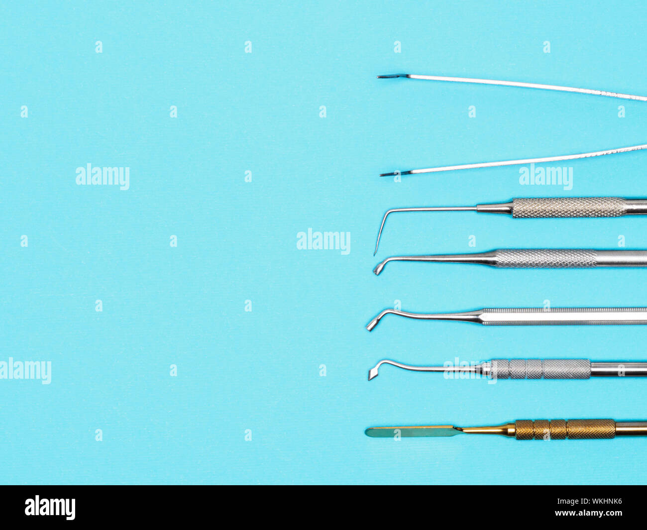 Dental tools on blue background with copy space. Dental care concept ...