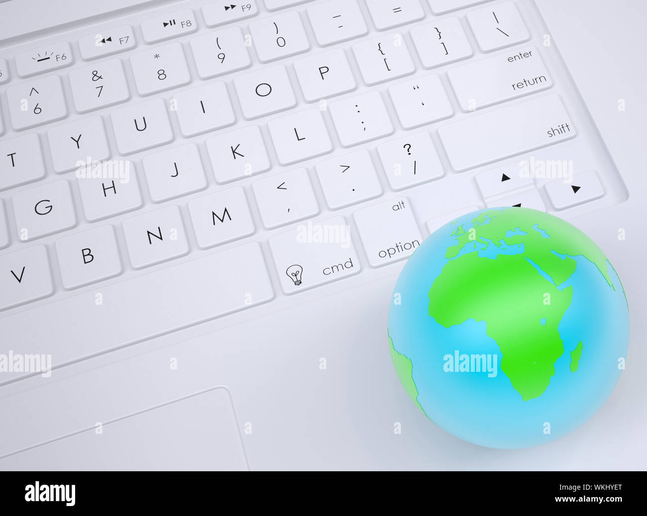 Earth on the keyboard. View from above Stock Photo