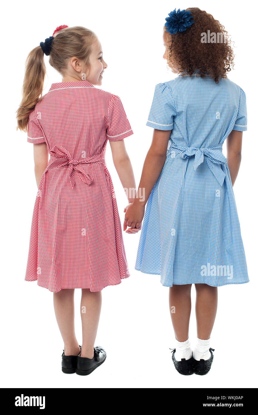 School girls holding hands hi-res stock photography and images - Alamy