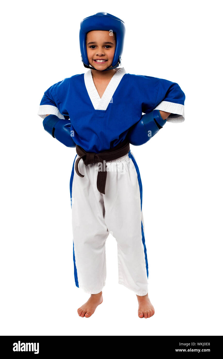 Little girl dressed in sporty karate attire Stock Photo - Alamy