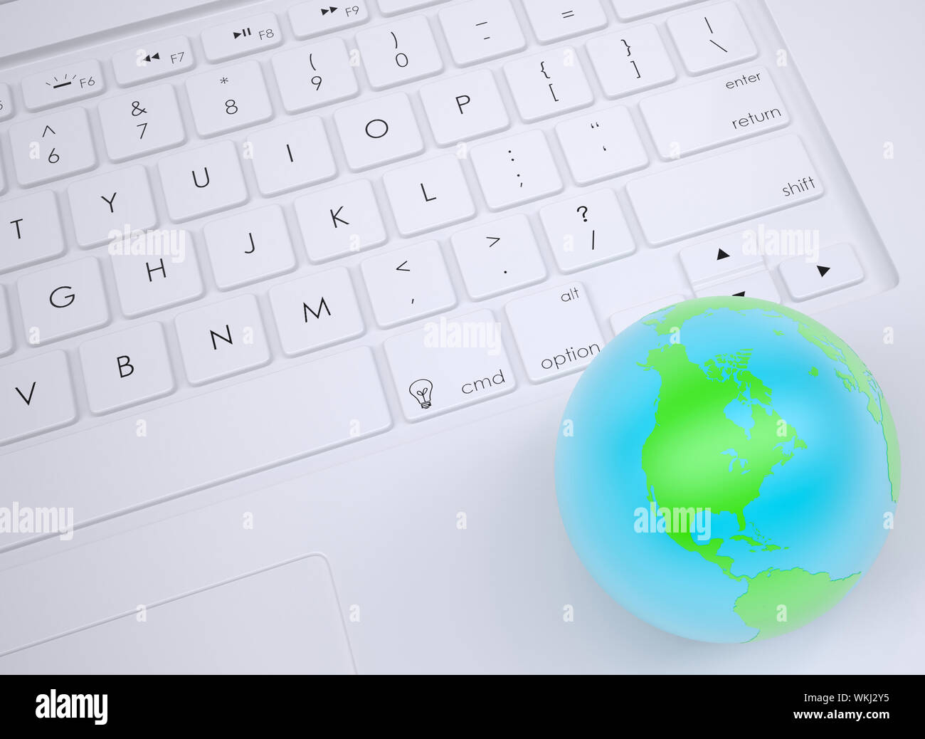 Earth on the keyboard. View from above Stock Photo