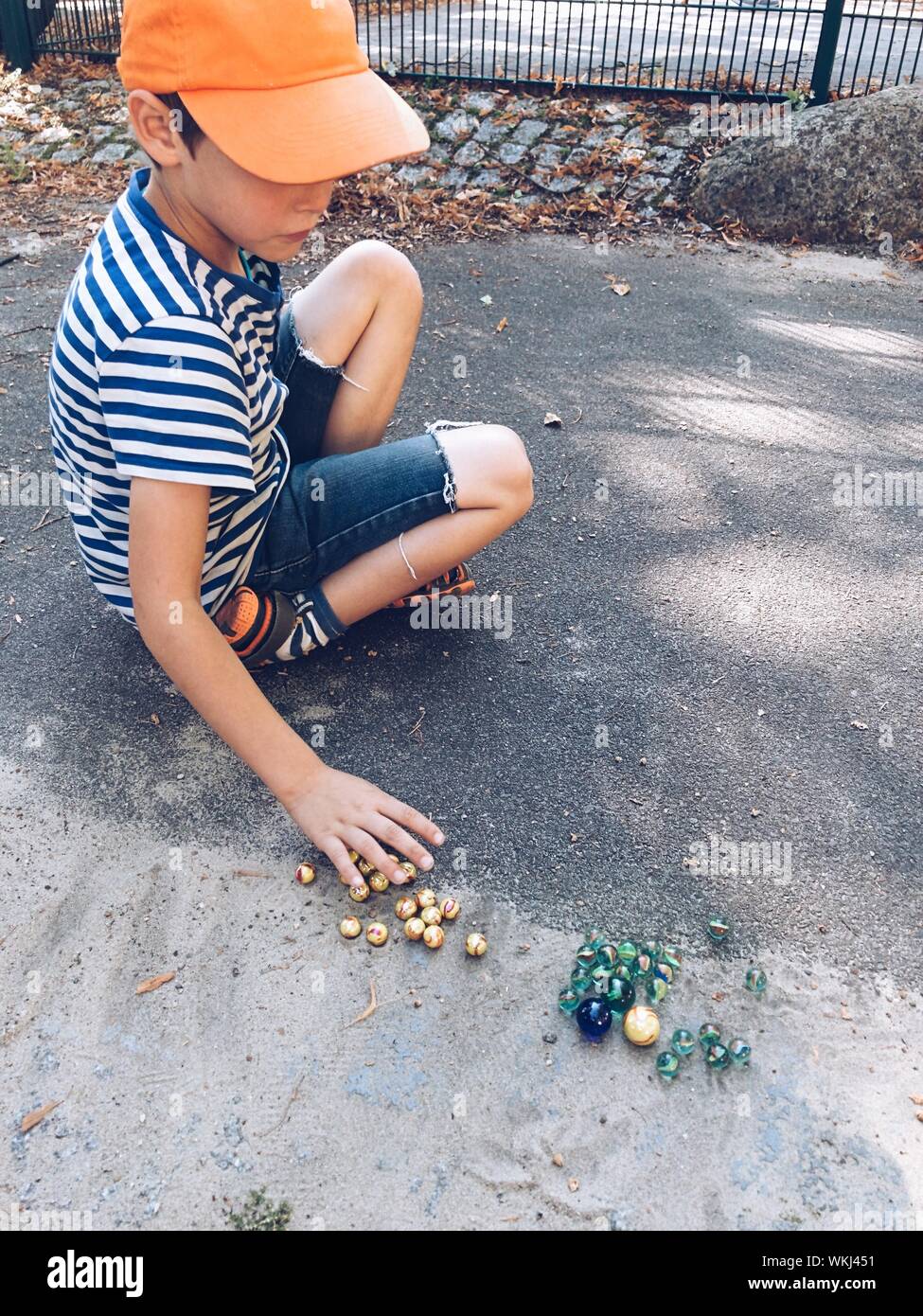 Boy Playing Marbles High Resolution Stock Photography and Images Alamy