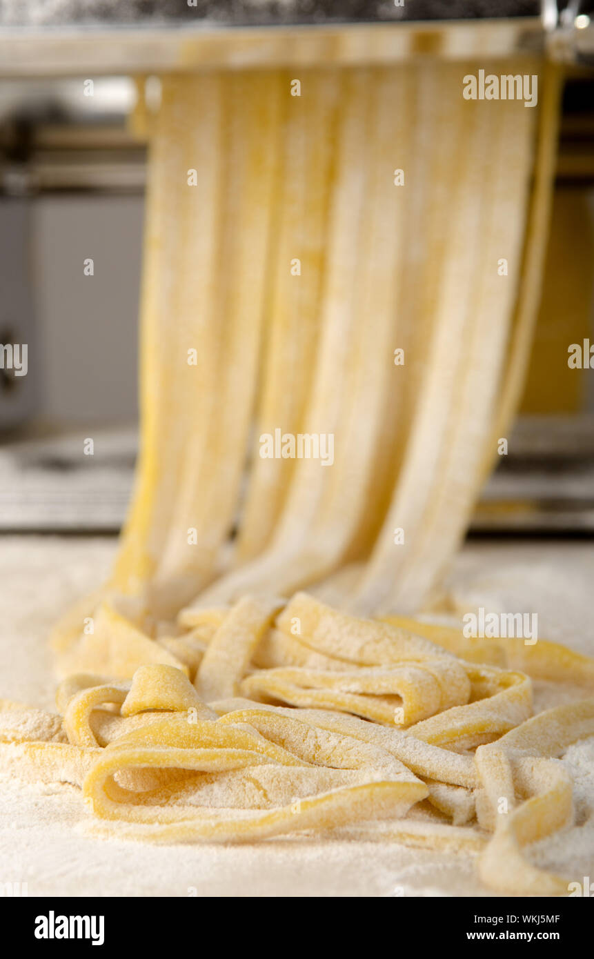 homemade pasta dough is being processed Stock Photo Alamy