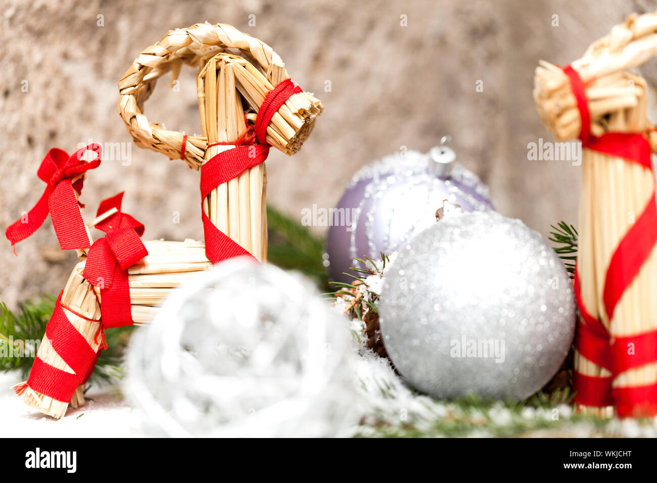 Silver Christmas bauble on a tree with snow Stock Photo - Alamy