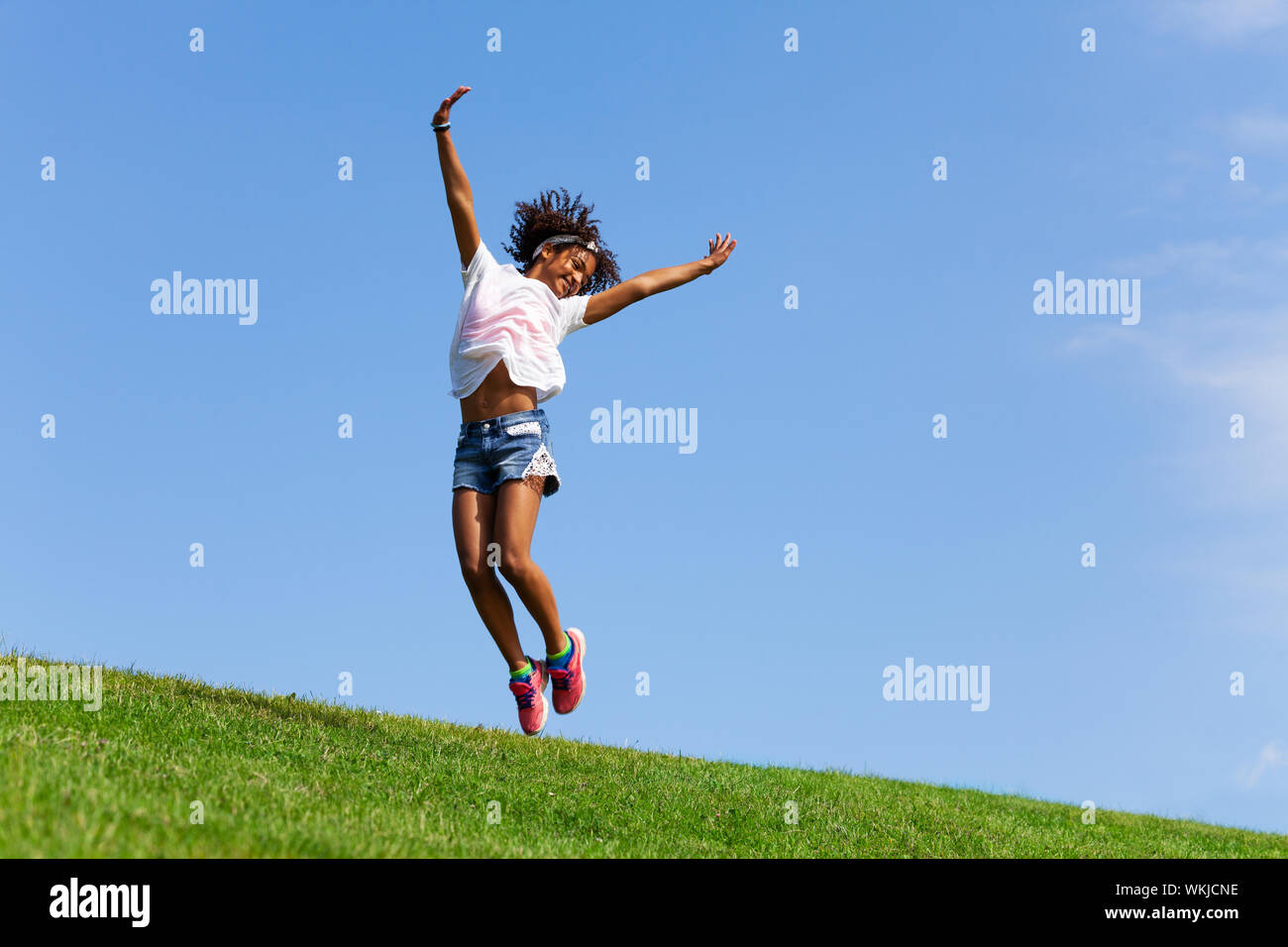 Child high jump hi-res stock photography and images - Alamy