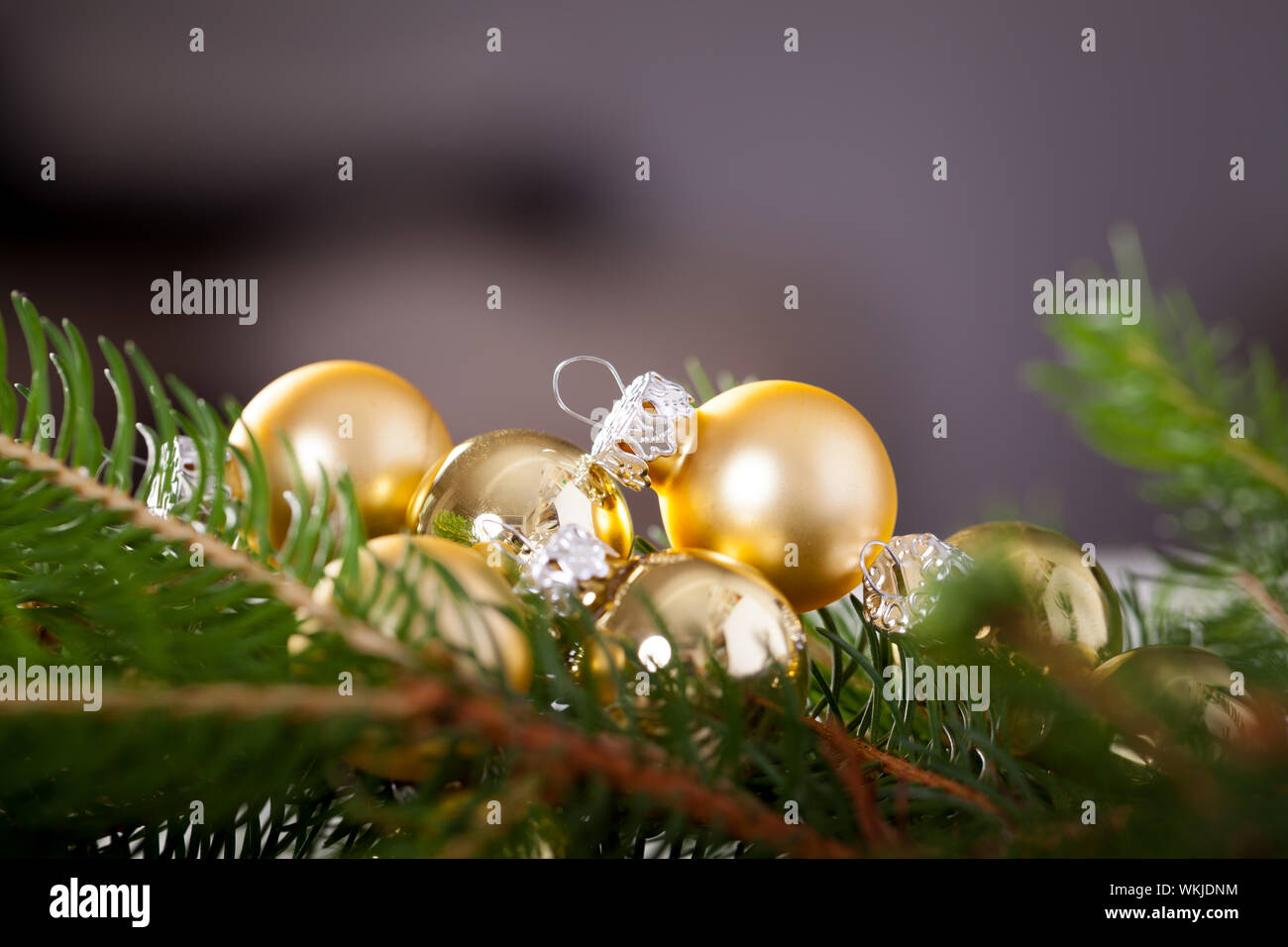 Golden Christmas decoration background with a variety of gold baubles ...