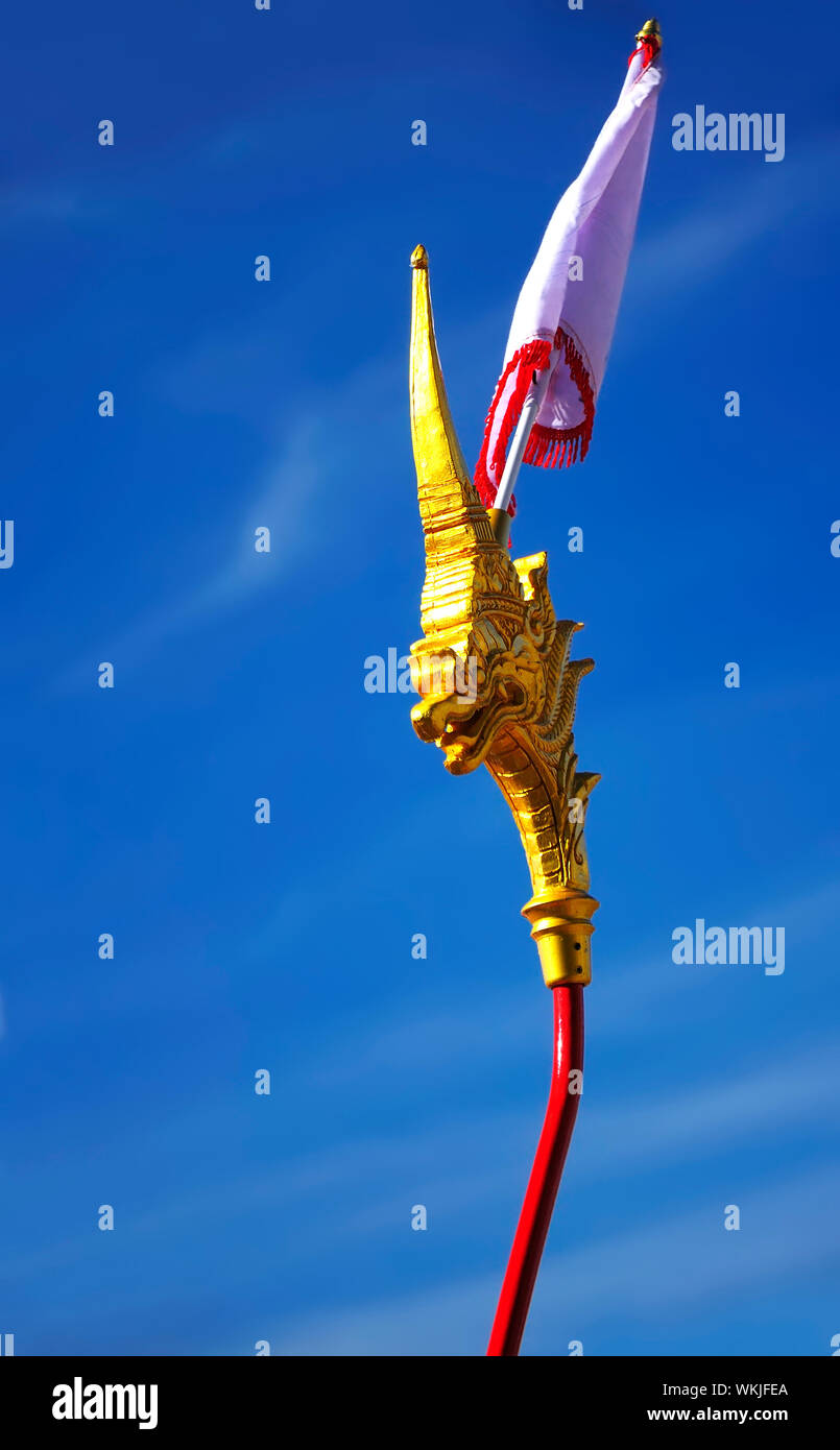 Low Angle View Of Flag On Dragon Pole Against Clear Blue Sky Stock Photo