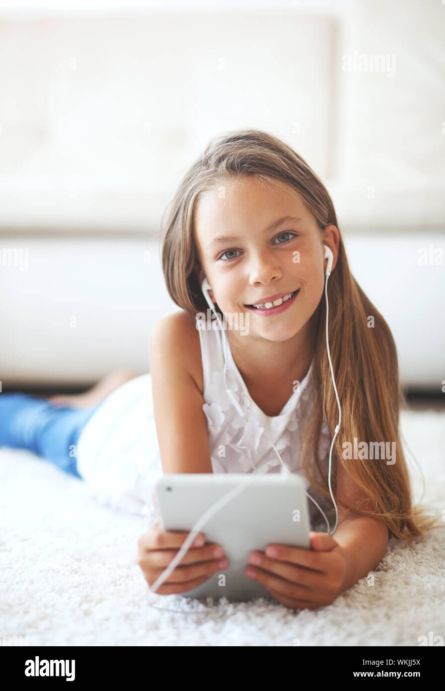 Teen girl laying on sofa hi-res stock photography and images - Alamy
