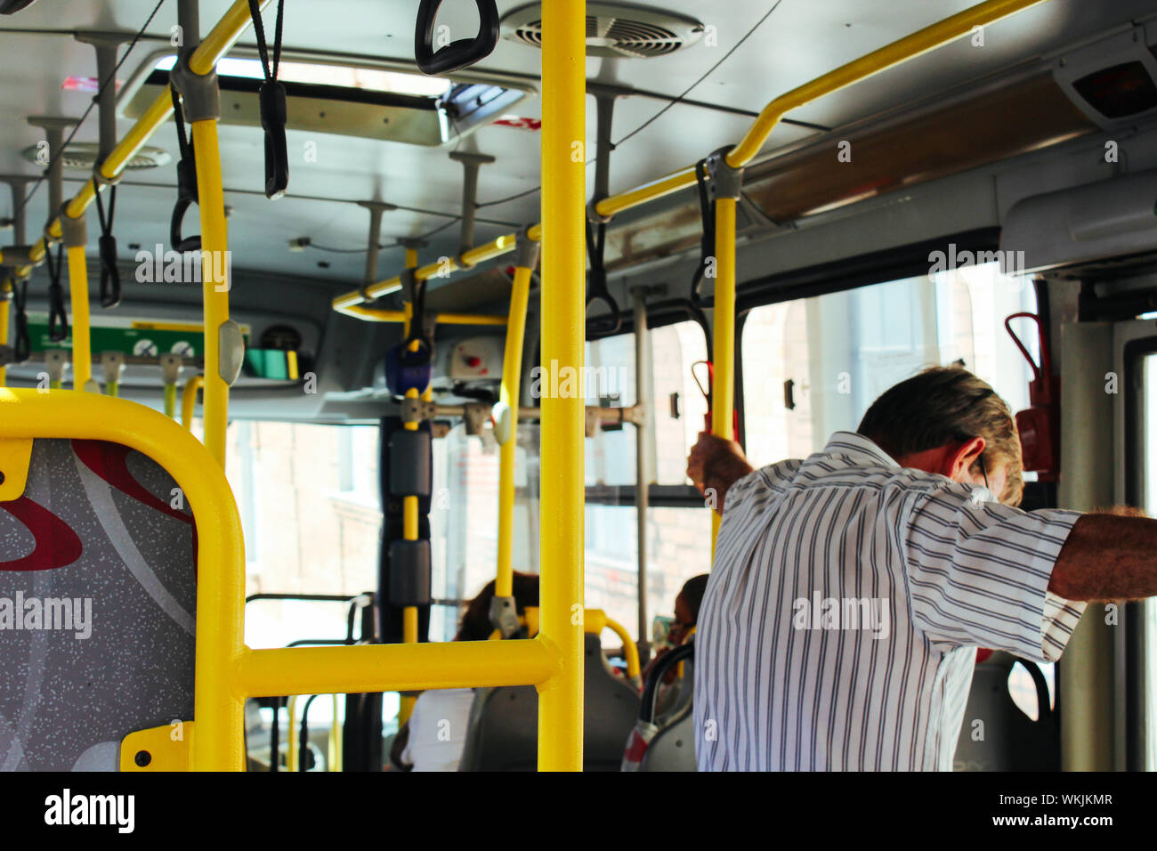 Adults on bus hi-res stock photography and images - Alamy