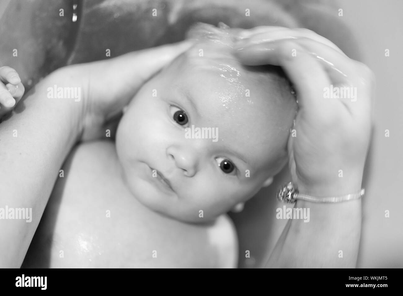 Baby bathtub mother hires stock photography and images Alamy