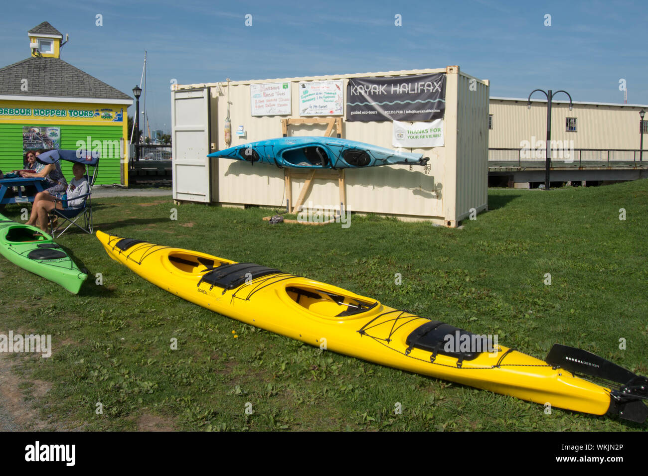 Canoes in harbour Halifax Nova Scotia Canada Kayak boat water sign