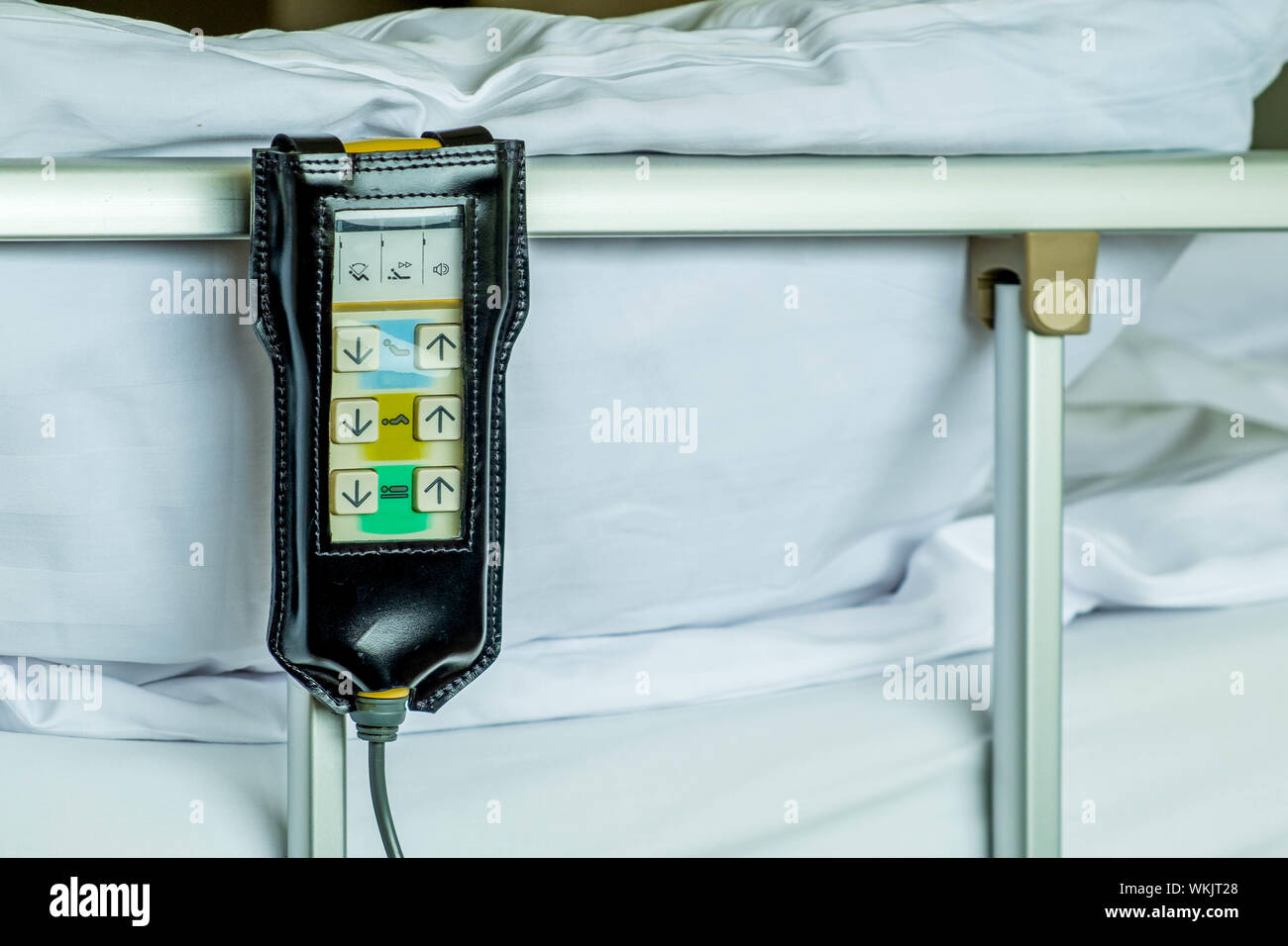 REmote control in hospital bed comfort patience close up Stock Photo