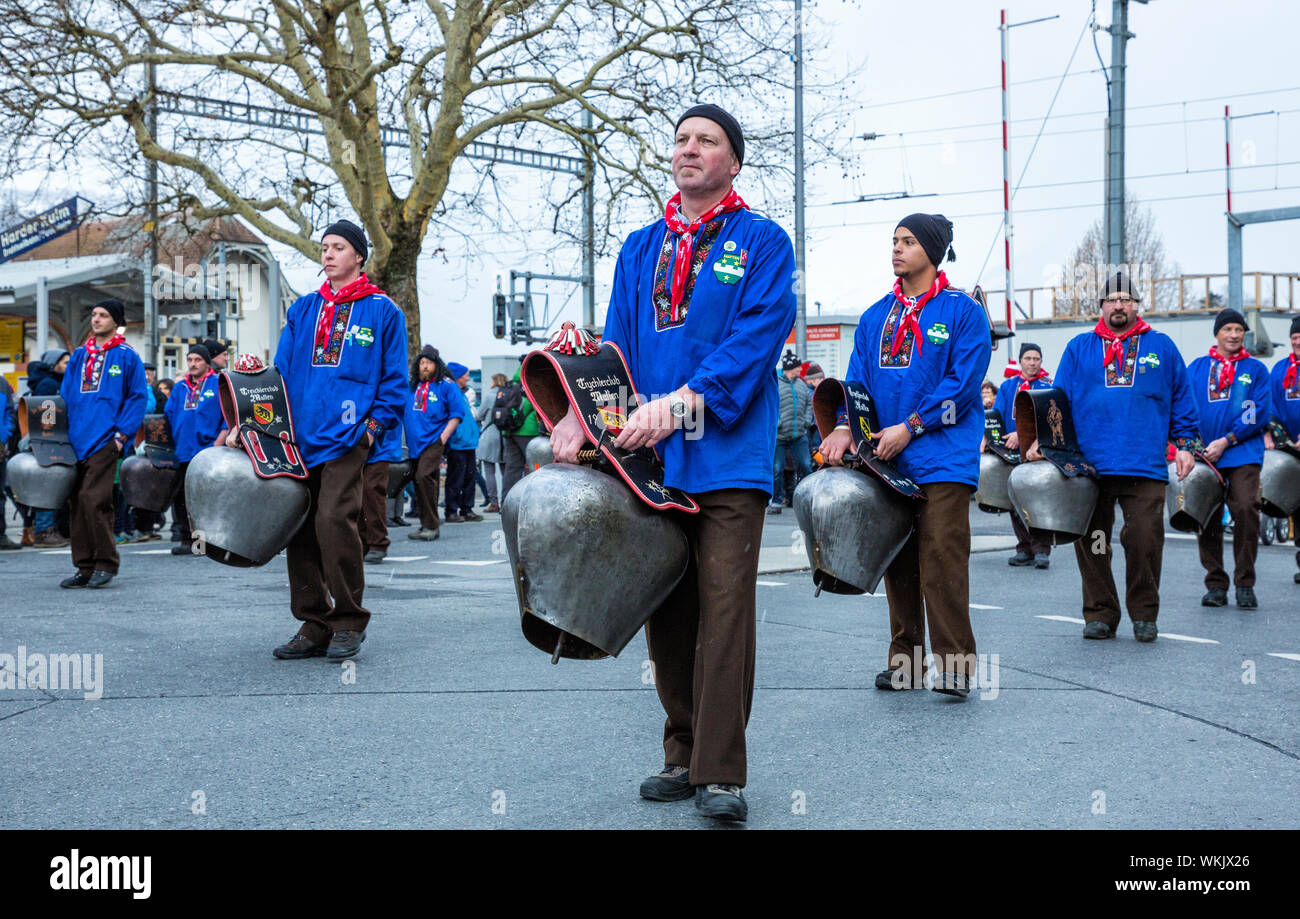Cowbell band in Harder-Potschete parade, Interlaken, Switzerland Stock Photo